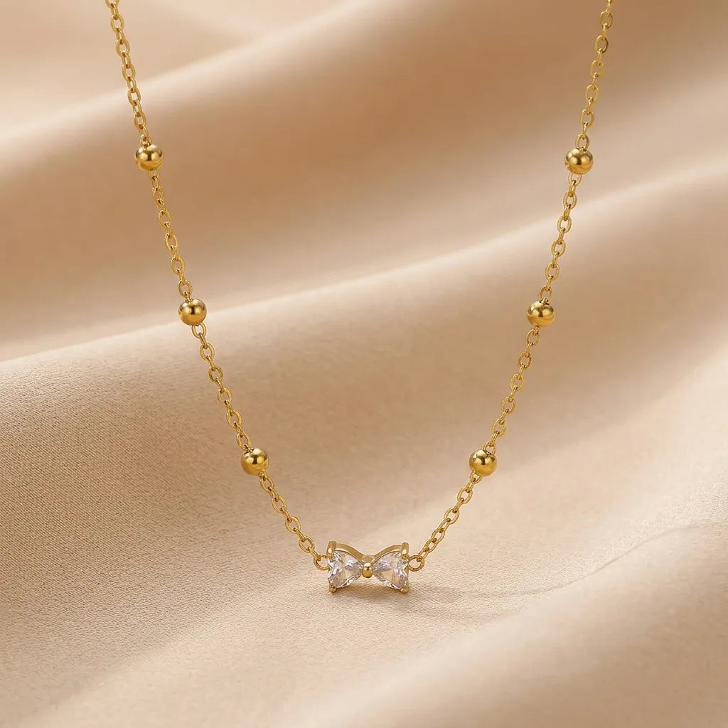 Crystal bow necklace Bloome.pk