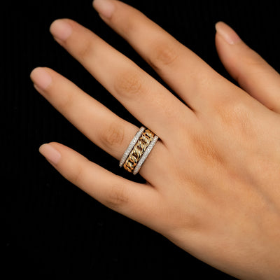 Gold Dioro Chain Spark Ring featuring a bold chain link center framed by sparkling cubic zirconia, crafted from anti-tarnish stainless steel with a glossy polished finish.