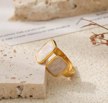 Load image into Gallery viewer, Side view of the Cloudstone Adjustable Ring highlighting the 18K PVD gold plating and polished marble effect pearl