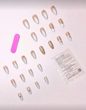 Load image into Gallery viewer, Set of false nails with a pink tool and packaging on a light background