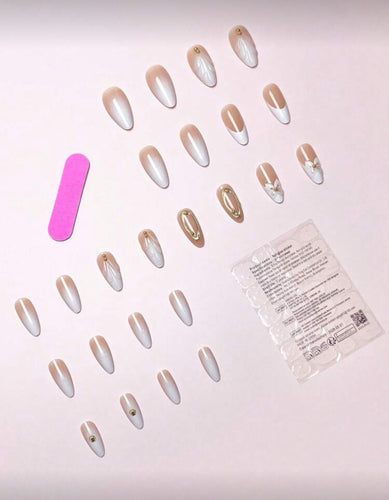 Set of false nails with a pink tool and packaging on a light background
