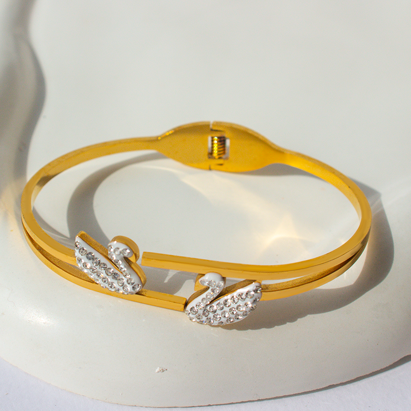 Delicate swan-shaped bangle, perfect for adding grace to your everyday look